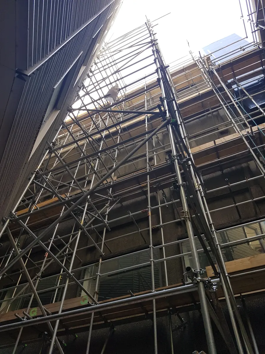 Looking up through a tall scaffold